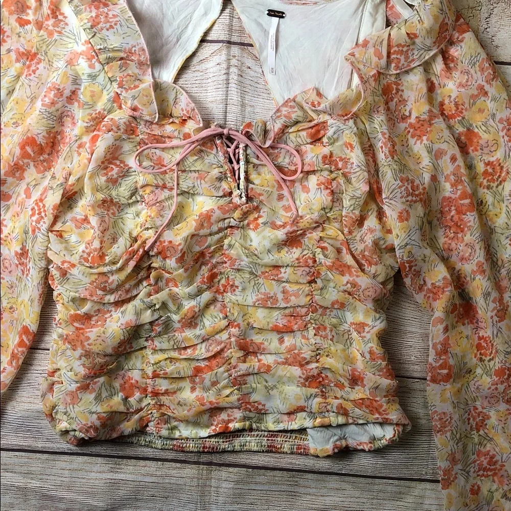 Free People Mabel Fairy Sheet printed ruched‎ blouse with a floral pattern